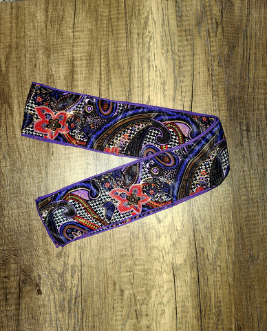 Purple, black, and red paisley